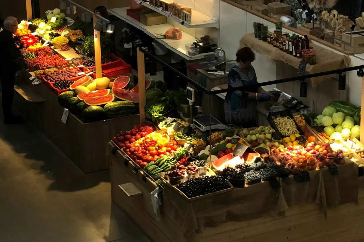 Fresh produce on display at Agenskalna tirgus market in Riga, Latvia. Photo by Krisjanis Kazaks from Unsplash