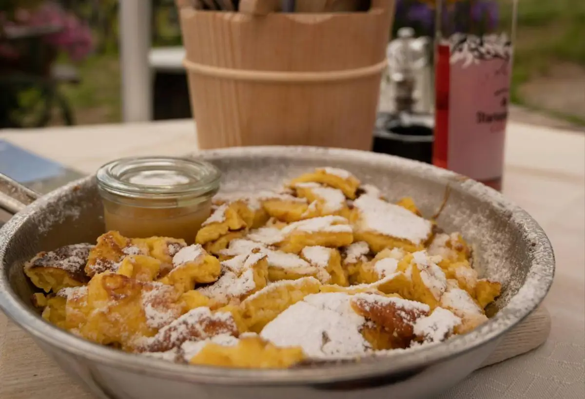 Traditional Austrian dish called Kaiserschmarrn in the Austrian alps. Photo by Babette Landmesser from unsplash 