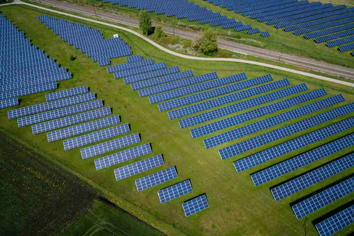 Aerial photo of the solar farm in Offingen, Germany. Photo by Andreas Gucklhorn from Unsplash