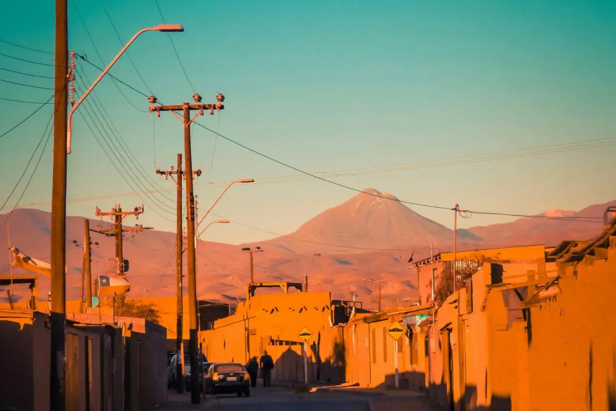 View of a street in San Pedro De Atacama, Chile at sunset. Photo by Vinícius Henrique Photography.