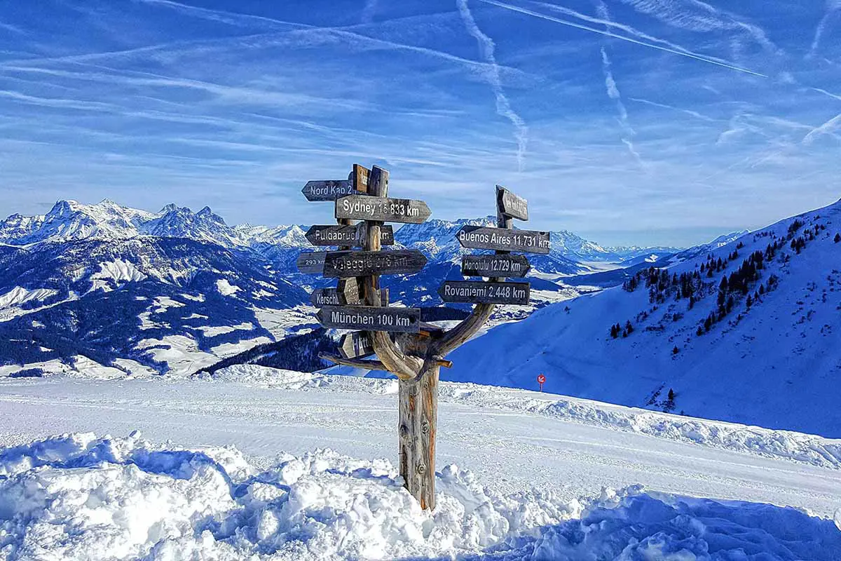 Wooden Signpost With Distance Markers on Snowy Mountain in Sankt Johann in Tirol, Austria. Photo by Daniel Stuhlpfarrer, Pixabay.