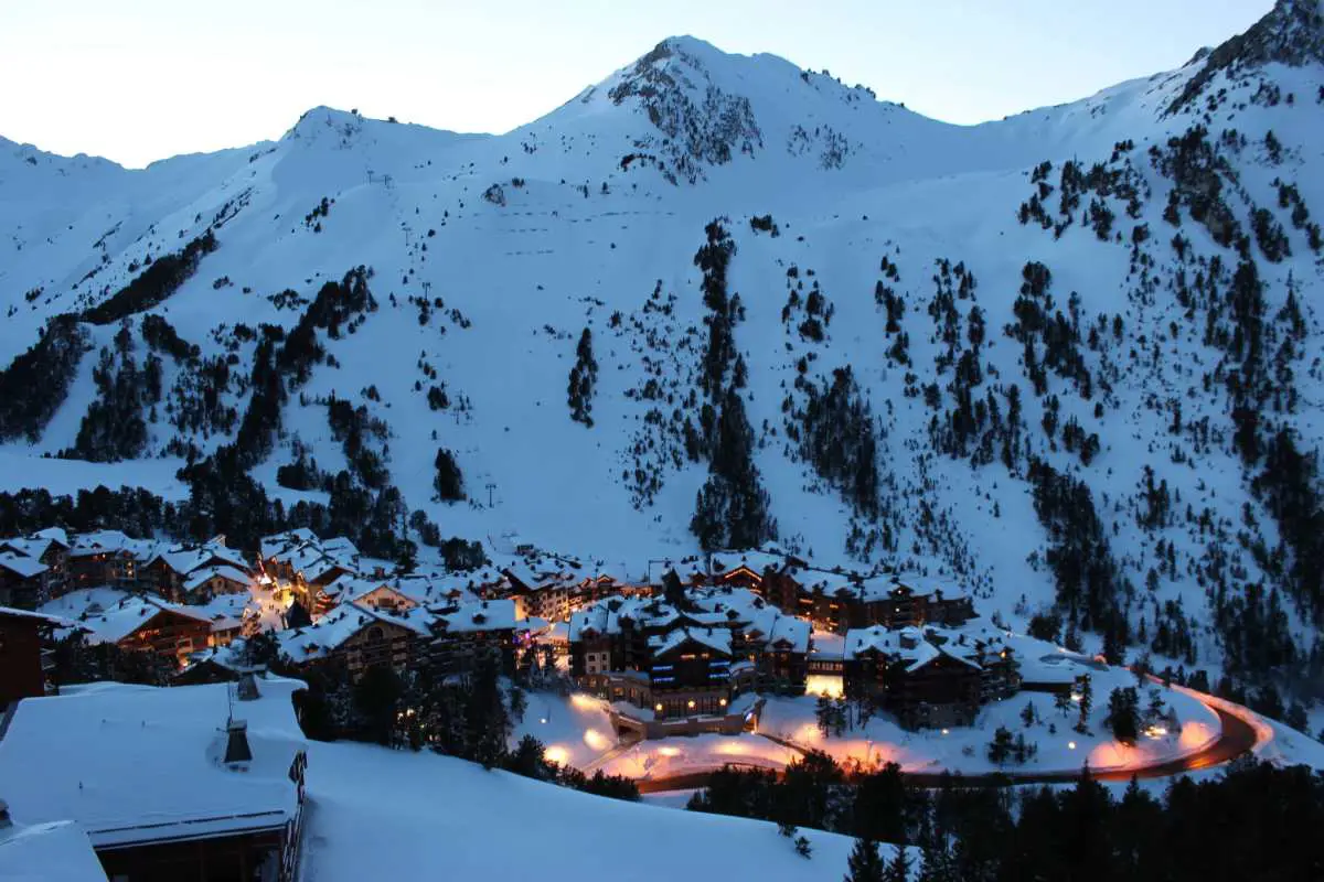 View of one of the villages of Les Arc's ski resort in France at dusk. Photo by Simonlees from Pixabay