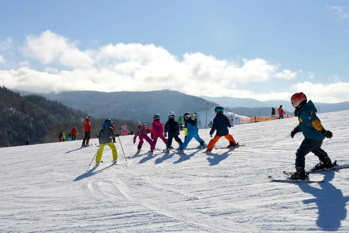 Children Learning to Ski With a Ski School in Alps. Image by Piro From Pixabay.